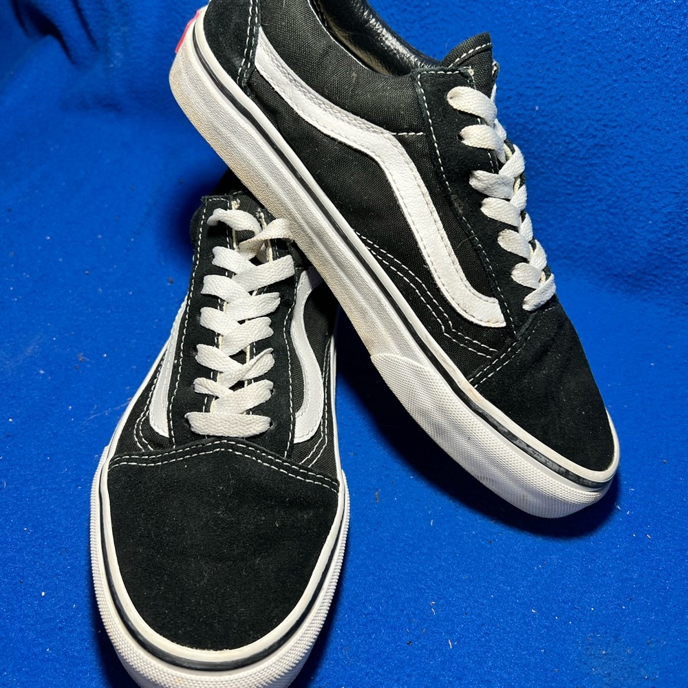 Vans size 7 in womens, 5.5 in mens
